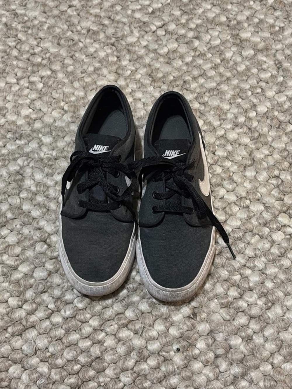 Nike Black Low-Top Sneakers with White Swoosh Toki Low - Men’s 7 Women’s 8.5